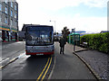 A TrawsCymru T2 bus service to Wrexham stands at Barmouth