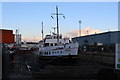 MV Balmoral in drydock at sunset