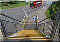 Down the steps of footbridge across Hatton Road South