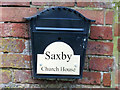 Sign by driveway to Church House at Saxby