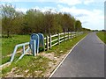 SD3401 : Squeeze stile on footpath beside the new Brooms Cross Road by Norman Caesar