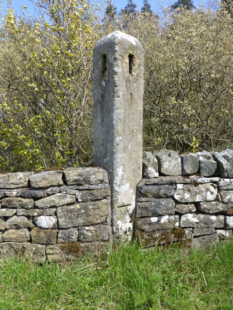 Old stone signpost