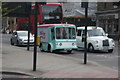 View of a Motoyogo yogurt milk float waiting at the lights on Curtain Road