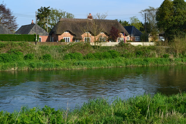 Thatched cottage beside the River Avon at Ibsley