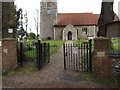 TM1551 : Church Gates & entrance to St.Peter's Church by Geographer