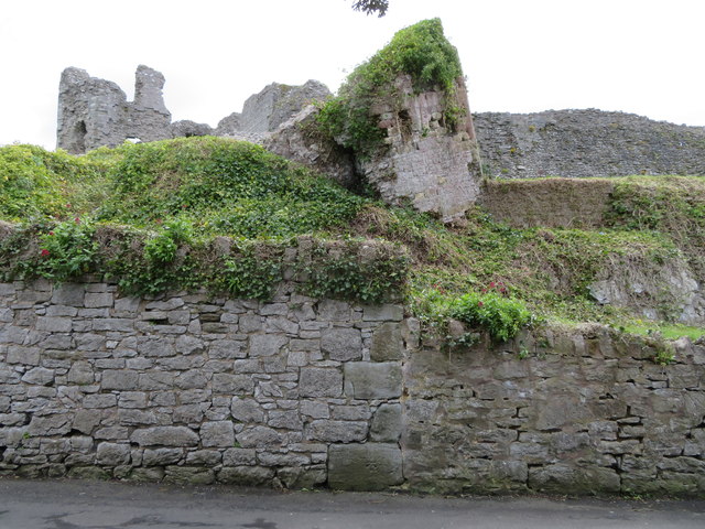 Castle Lane wall, the castle and a bench mark