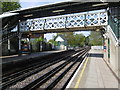 Footbridge and signal box at Woodside Park Underground station