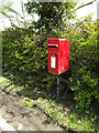 TM1852 : High Road Postbox by Geographer