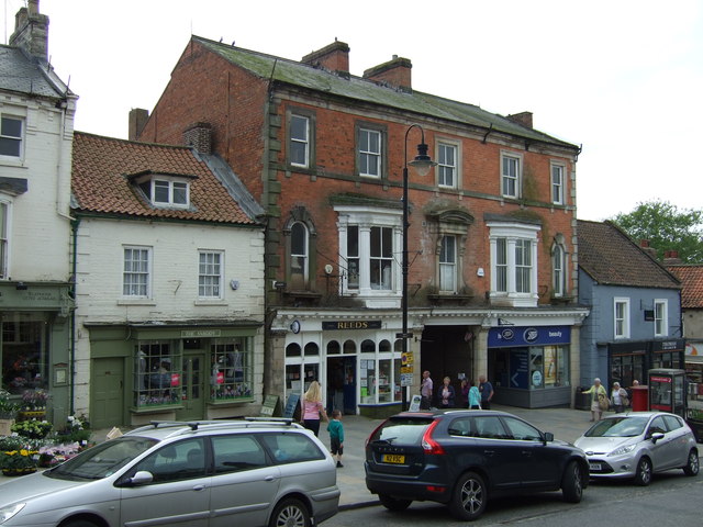 shops-on-market-place-pickering-jthomas-cc-by-sa-2-0-geograph