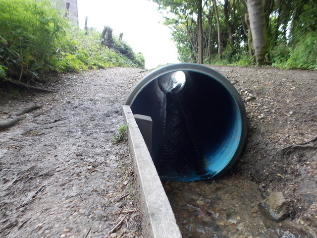 Ringstead: the stream in The Glen enters a tube