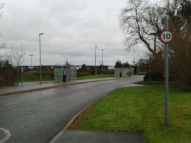 Bus stops on the university campus on a wet day in February