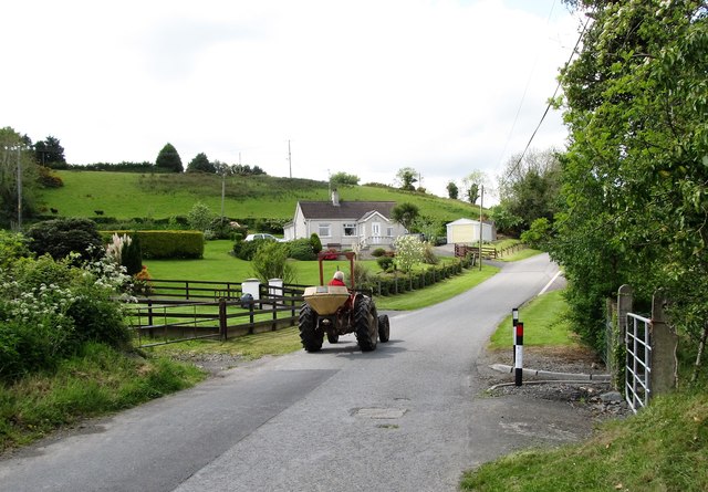 Vintage tractor with hopper on the Magheratimpany Road