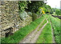 The Shepherd House bridleway passing a well, Luddendenfoot