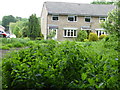 Dwellings on Westway seen emerging from Heathy Ground