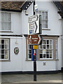 TM0854 : Roadsigns on the B1113 High Street by Geographer