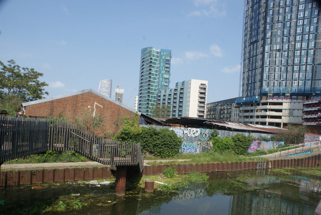 View of new flats on Stratford High Street from the raised walkway leading to Three Mills Island