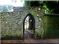 Arched gateway in stone wall, Magheralin