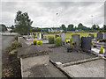 S6753 : Graveyard and sports at Goresbridge by Neville Goodman