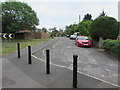 Black metal posts across Station Road, Nailsea