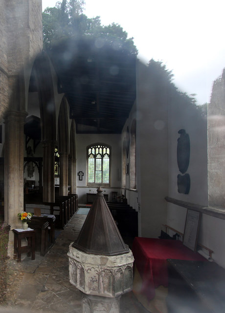 All Saints, Odell - Interior through a window