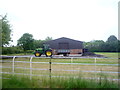 Farm building and tractor off Sandhole Lane