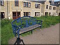 Blue bench by the canal