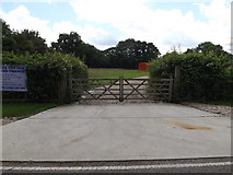 TM0946 : Entrance to Woodlands Farm by Geographer
