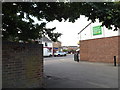 TM1246 : Car Park entrance of the East of England Co-op by Geographer