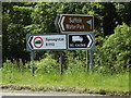 TM1148 : Roadsigns on the B1113 Loraine Way by Geographer