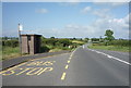 NY2850 : Bus stop on the A596 by JThomas