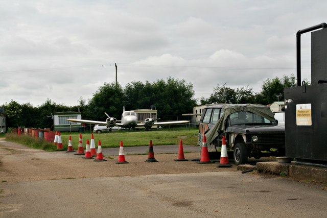 Accommodation and a parked aircraft at the Sibson Aerodrome Parachute Centre
