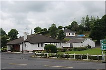 M2594 : Roadside houses near Ballyvary by Alan Reid