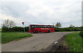 Berrycott Lane/Paudy Lane junction with a Total Travel bus