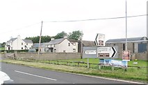 J2733 : Farm houses at the junction of the B8 and the A35 at The Square by Eric Jones