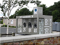 J0406 : Open air launderette at Dundalk's Tesco Extra by Eric Jones
