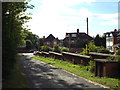 West down the former goods yard approach road, off Station Avenue, Warwick