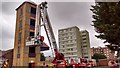 View of the bucket of the fire engine being lowered on the fire engine in Barking Fire Station