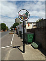 TL9978 : Hopton Village sign by Geographer
