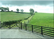 H7406 : Farm access road on the south side of the R178 at Corcreagh by Eric Jones