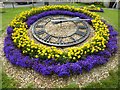 Clock in gardens beside the Almonry