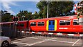 View of a Class 455 train leaving Strawberry Hill Station