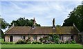 Holkham Hall: Almshouses by the gateway to the park