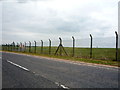 SK4325 : East Midlands Airport perimeter fence by JThomas