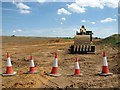 Digger parked on the Northern Distributor Road