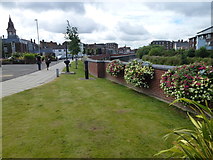 TF4609 : Flood defence wall - Wisbech in Bloom 2016 by Richard Humphrey