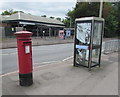 Queen Elizabeth II pillarbox and BT phonebox opposite Cheltenham Spa railway station