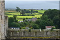 Farmland under stormy sky, from Caernarfon Castle