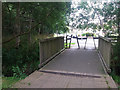 SE2840 : Bridge over a stream by Alwoodley village green by Stephen Craven