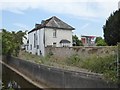 Old house and wall by River Lowman