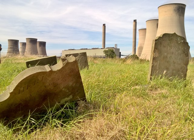 Fallen gravestones in old graveyard at West Burton